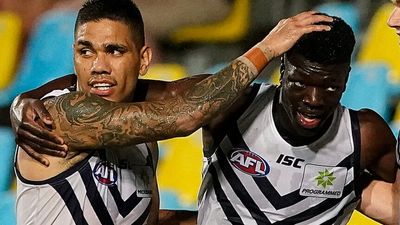 Fremantle Dockers condemn 'cowardly' racist abuse of Michael Frederick and Michael Walters