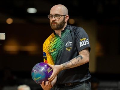 Cooley makes history with tenpin gold