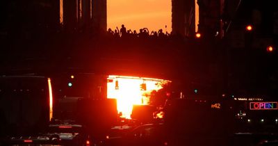 Dramatic 'Manhattanhenge' images where sun aligns perfectly with skyscrapers