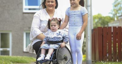 Brave girl, 3, born with spinal cord outside body now chasing siblings in Scotland's smallest wheelchair