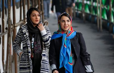 Iranian women removing headscarves to protest mandatory hijab laws