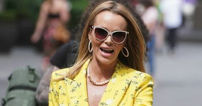 Amanda Holden flashes her legs in matching yellow blazer and skirt in heatwave