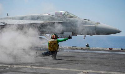 Storm knocks $67m US fighter jet off aircraft carrier into Mediterranean