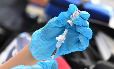 As Covid surges in US, health officials say vaccines remain key