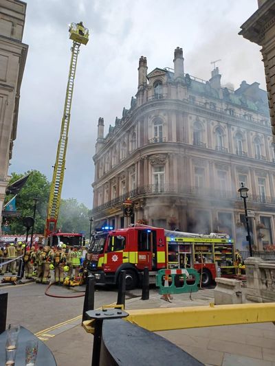 Firefighters battle Trafalgar Square pub blaze