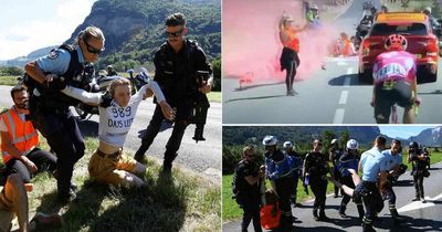 Tour de France chaos as climate activists let off flares and chain themselves to road