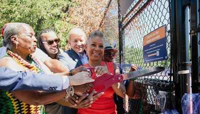 Whitney Young High School’s tennis courts get facelift, new name