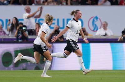 Germany ease to win over Spain to qualify as group winners