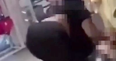 Horrifying moment woman defecates on shop floor during violent Primark brawl