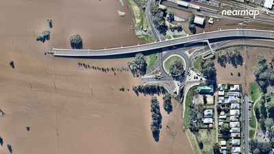 Aerial images show how roads and a highway to major regional NSW towns were submerged in July flood