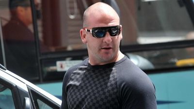 Comanchero bikie boss Mark Buddle in police custody facing extradition to Australia