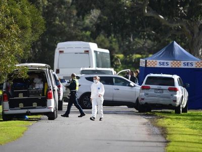 Victoria Police find body in burnt-out car