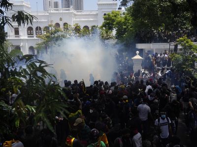 Protesters in Sri Lanka brave tear gas and storm prime minister's office