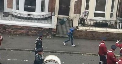 Flute band which had bin hurled at them 'believed bomb had been thrown'