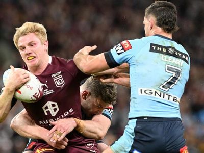 Young Tommy gun fires as Maroons triumph