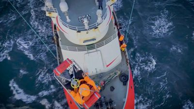 Hull Of A Rescue: Navy Plucks Heart Attack Trawlerman From Deck Of Ship