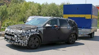 New Hyundai Kona Spy Shots Capture Crossover Towing A Heavy Load