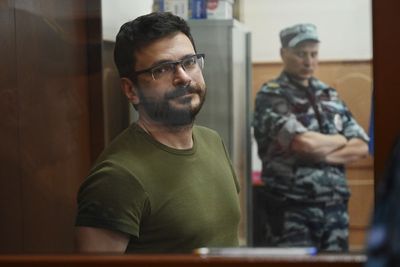 Russia jails opposition figure for criticizing its military