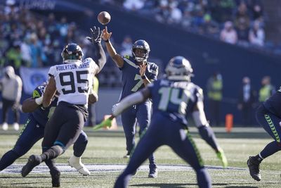 Seahawks QB Geno Smith practicing deep throws with WR D.K. Metcalf