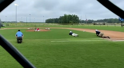 Video shows Little Leaguers jumping for cover as gunshots fired