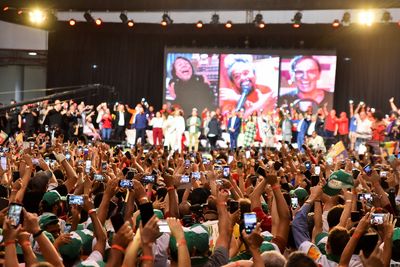 Analysis: Lula in flak jacket, Brazil on edge as political killing mars campaign