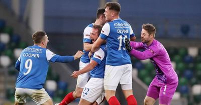 Linfield 2 TNS 0: Blues progress in Champions League after dramatic night at Windsor Park