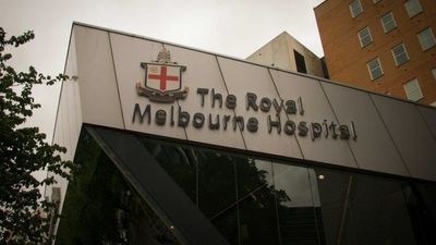 Royal Melbourne Hospital expands emergency department as nearly 2,000 hospital workers furloughed across Victoria