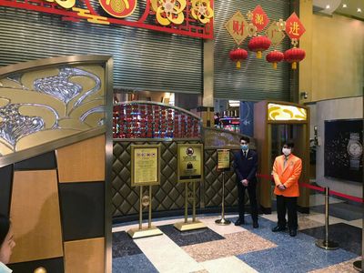 In COVID closedown, Macau casinos take billion-dollar hit holding out for new licences