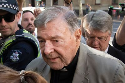 Cardinal George Pell sued by father of Australian choirboy over sexual assault claims