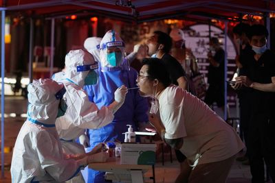 Some Chinese cities order more frequent COVID testing as cases creep higher