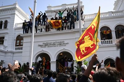 Sri Lanka leader flees to Singapore