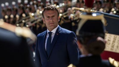 Macron warns economic hardship is coming in Bastille Day interview