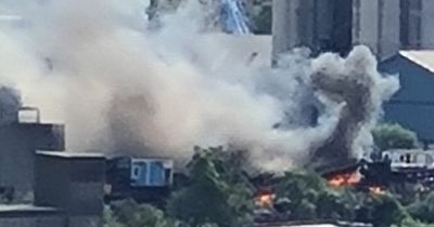 Govan fire erupts as crews tackle blaze with plumes of smoke seen across city