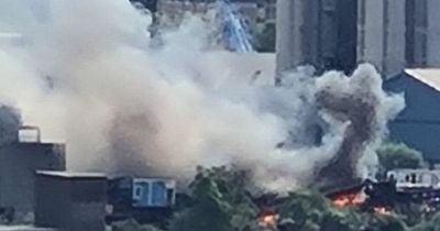 Massive blaze sends thick plumes of black smoke billowing into Glasgow sky as fire crews race to scene