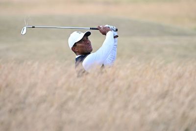 Limping Tiger slumps to six-over on British Open return