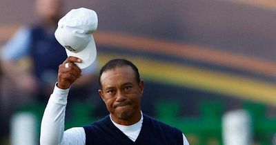 Tiger Woods aiming to make cut after disastrous Open round leaves him 14 shots off lead