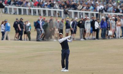 Tiger Woods sees his hopes of Open glory disappear into Swilcan Burn