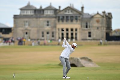 Young leads from McIlroy at British Open but woe for Woods