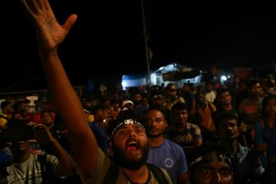 Sri Lankans await formal resignation after president flees