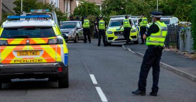 Man taken to hospital and road closed after armed police called to disturbance in Perth street