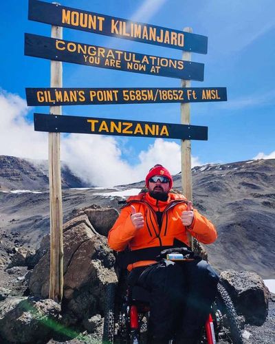 Man climbs Kilimanjaro in a wheelchair after being paralysed in Manchester Arena terror attack