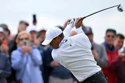 Tearful Woods set to miss British Open cut