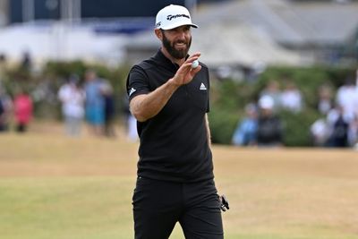 Dustin Johnson takes British Open lead as emotional Woods bows out