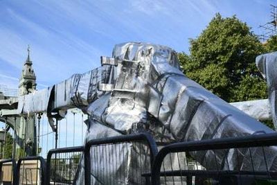 Hammersmith Bridge wrapped in foil during heatwave