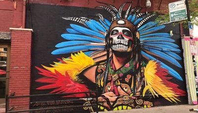 In Pilsen, Manuel ‘MATR’ Macias says his new mural of an Aztec warrior is meant to evoke struggle