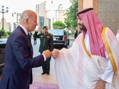 Joe Biden fist bumps Saudi crown prince on arrival in Jeddah