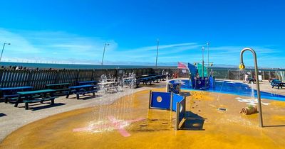 The outdoor splash park that only opens in the sunshine and is next to a huge sandy beach
