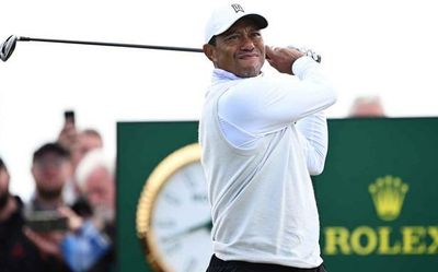 No trophies for Woods and Mickelson after missing Open cut
