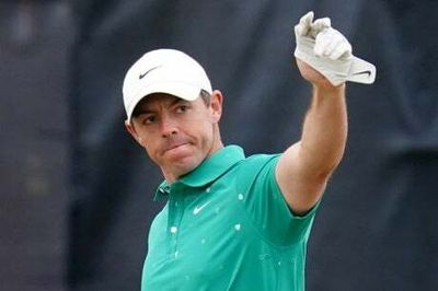 The Open: Rory McIlroy on the charge as superb bunker eagles earns share of the lead ahead of final round