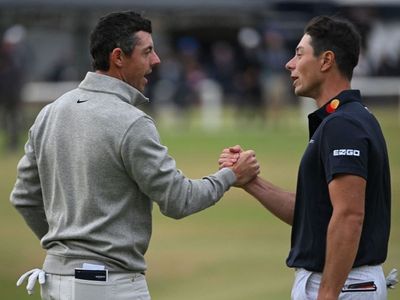 Rory McIlroy shares Open lead as he chases ‘Holy Grail of golf’ at St Andrews